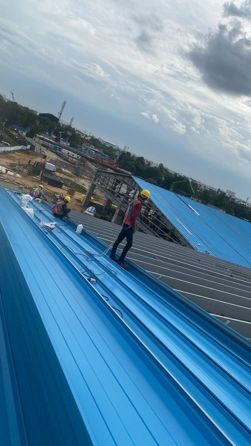 Architectural Kalzip standing seam roofing for IICC New Delhi: Specialized large-span aluminum building envelope by Rishonn & Reyansh for India's premier convention landmark.